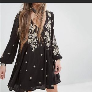Free People embroidered black  tunic sz. M
